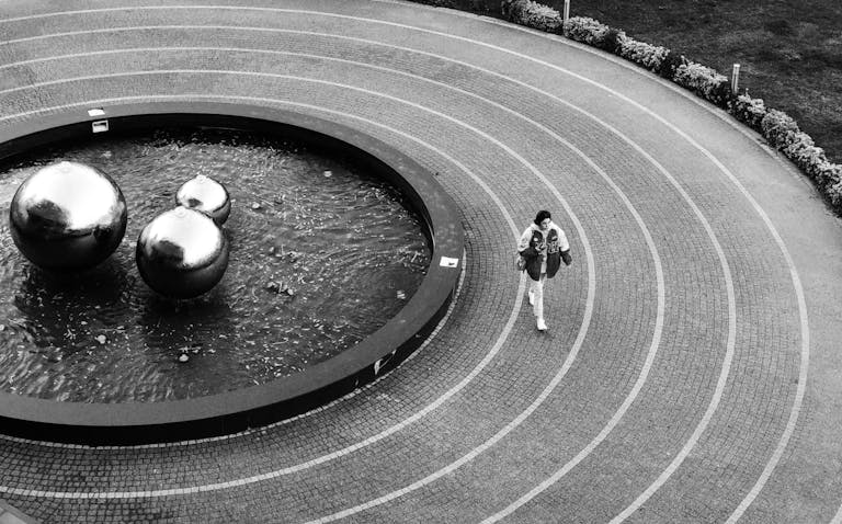 Black and white photo of a fountain with metal spheres in Sakarya, Türkiye.